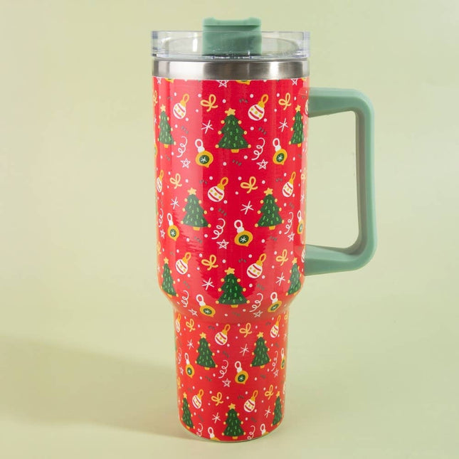 Red 40oz tumbler with green handle and lid, decorated with Christmas trees, ornaments, stars, and bows – holiday-themed stainless steel mug with clear lid.