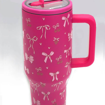 A tall 40oz stainless steel travel tumbler with a built-in handle, flip straw lid, and tapered base designed to fit in car cupholders.