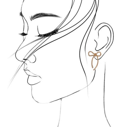 Line art of a woman's profile with a detailed earring on a white background