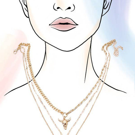 Gold plated three layer western style necklace featuring polished bull horn charm with elongated link chains and adjustable lobster claw clasp displayed on a feminine styled background.