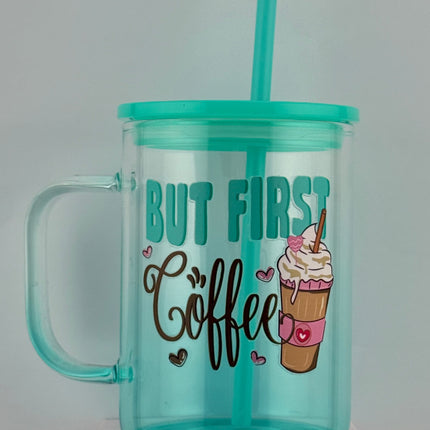 Turquoise tumbler with handle and straw, featuring ice cream cone design and text on a gray background.