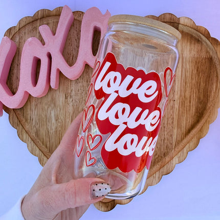 Clear 16oz Libbey glass cup with Valentine-themed UV DTF designs, bamboo lid, and glass straw