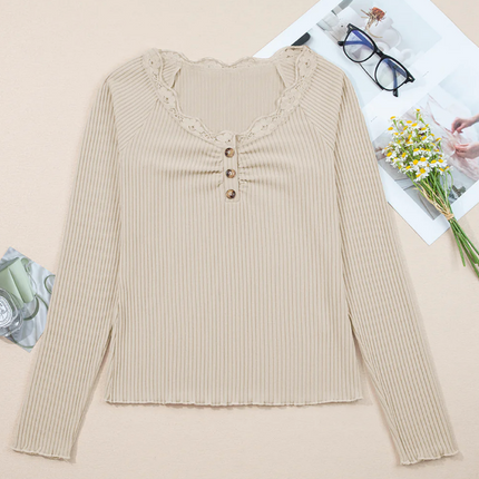 Beige ribbed knit top with lace trim neckline, button details, and lettuce-edge sleeves and hem, long sleeve fitted silhouette