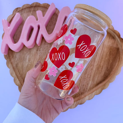 Clear 16oz Libbey glass cup with Valentine-themed UV DTF designs, bamboo lid, and glass straw