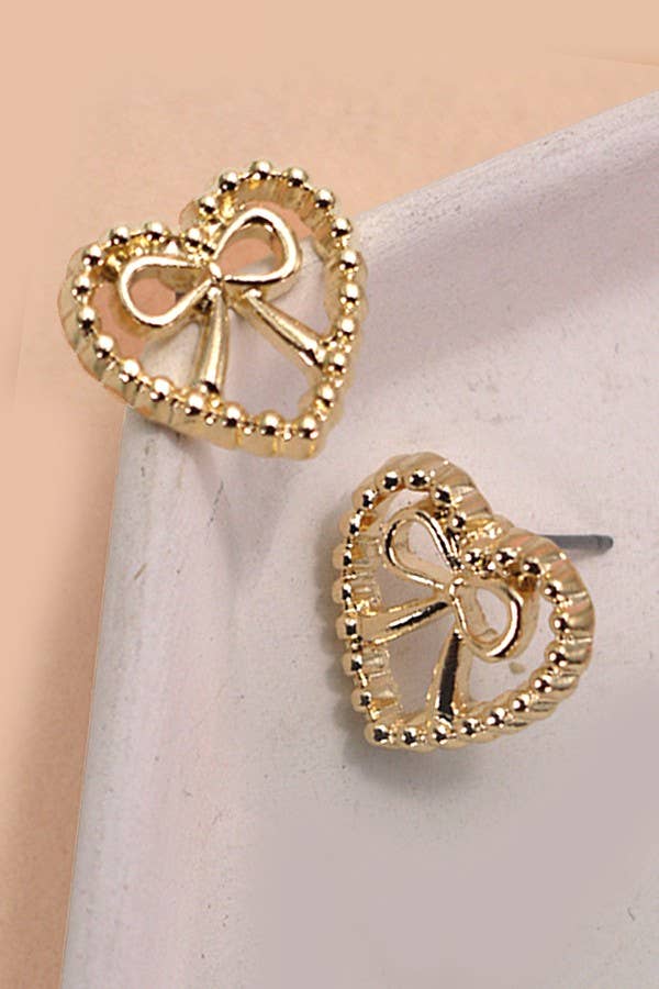 Gold-plated heart-shaped bow stud earrings with post back and anti-tarnish finish, 0.7 inches wide.