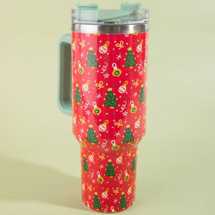 Red 40oz tumbler with green handle and lid, decorated with Christmas trees, ornaments, stars, and bows – holiday-themed stainless steel mug with clear lid.