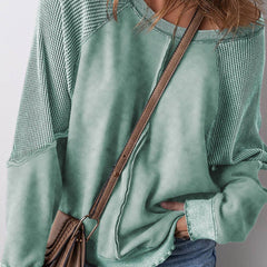 Mineral Blue waffle knit oversized sweatshirt with raglan sleeves, exposed seam down the front, and subtle lettuce-edge trim on cuffs and hem