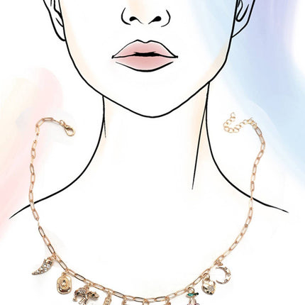 Gold western charm necklace featuring boots, cowboy hat, horseshoe, and heart charms styled on a pink background.